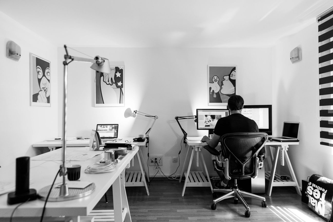 Person sitting at a home office desk